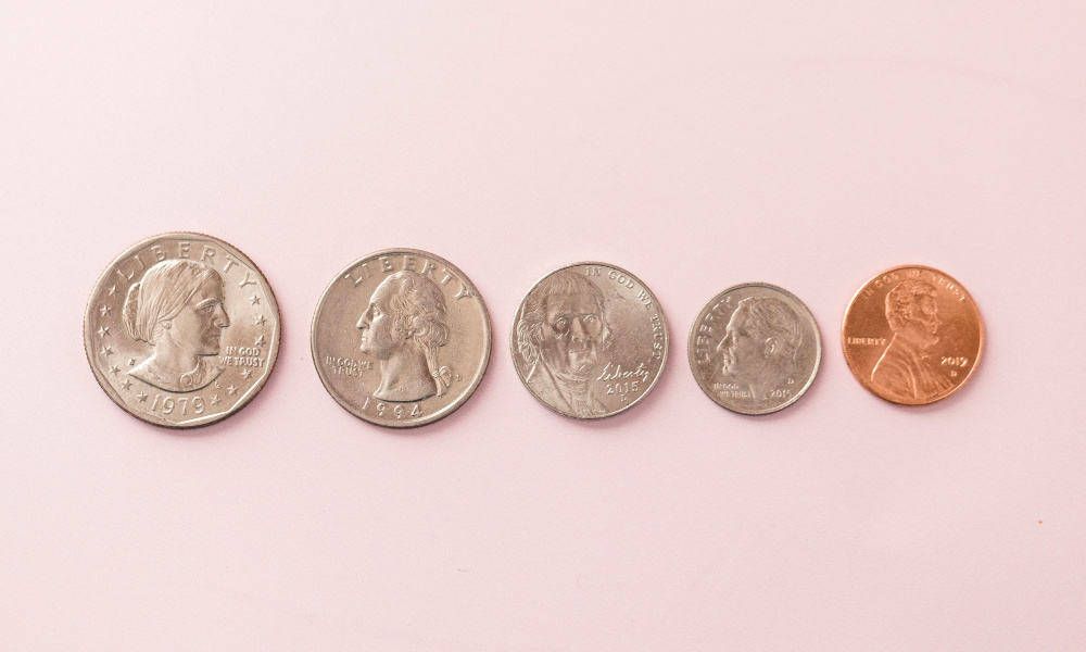 row of coins saved from using the best cashback apps in 2021